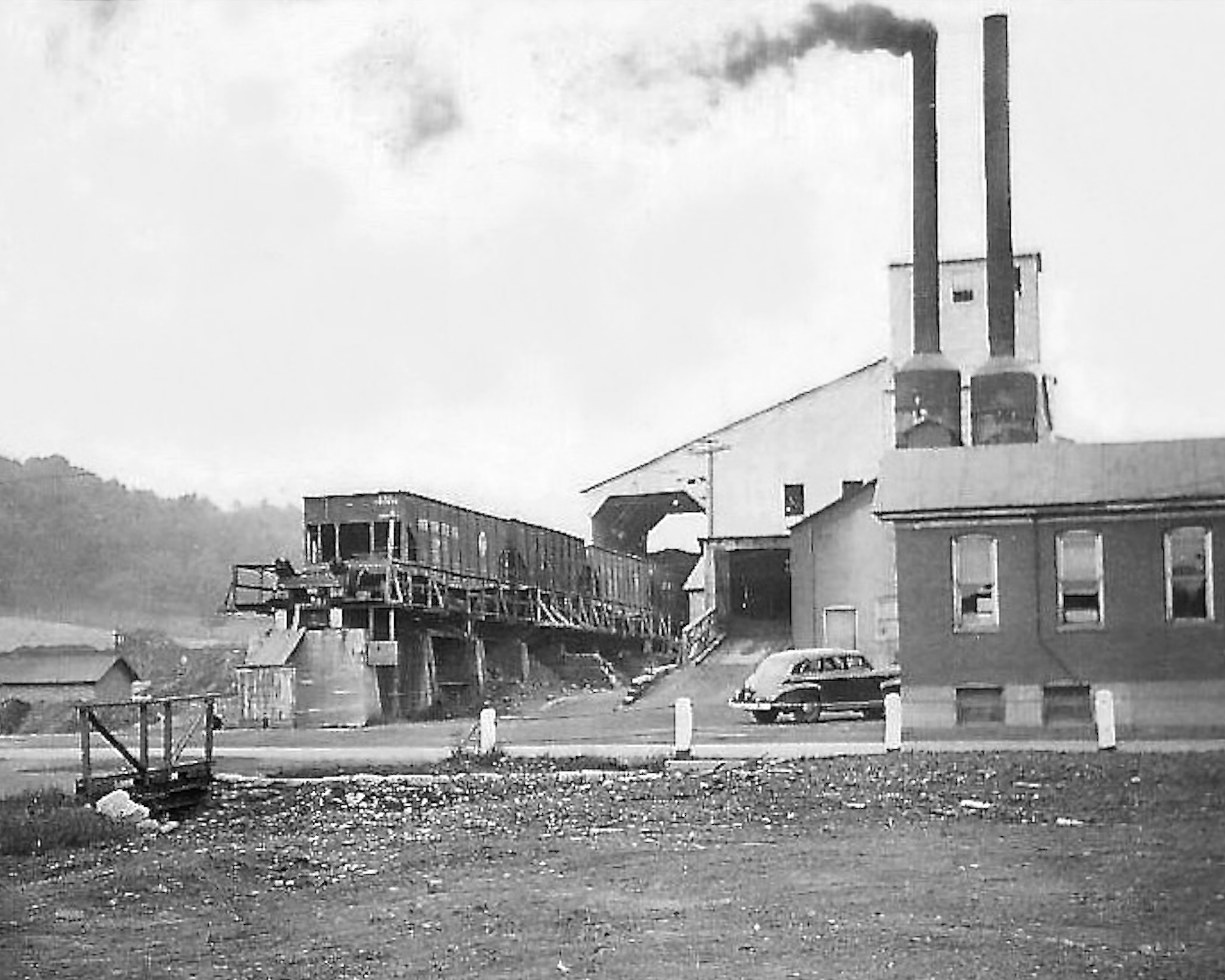In a photograph of Snow Shoe Fire Brick from around 1949, the trestle where coal was unloaded can be seen. (Michael