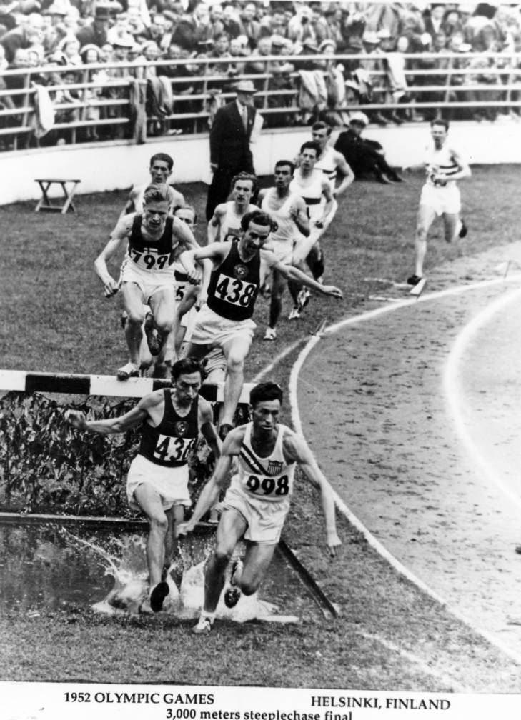 Horace Ashenfelter competes in the 3,000 meters steeplechase at the 1952 Olympic Games in Finland