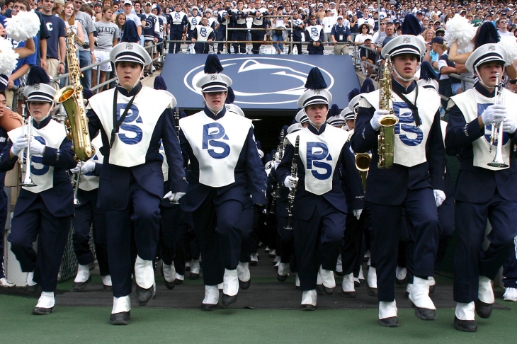 The Blue Band marches onto the field before the beginning of a football game. (Penn State Archives)
