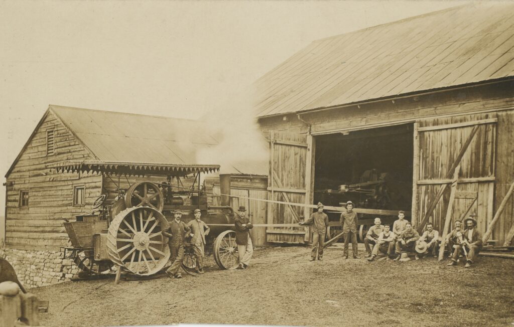 Men with the equipment pose in front of a Boalsburg barn. (Joan Brower collection)