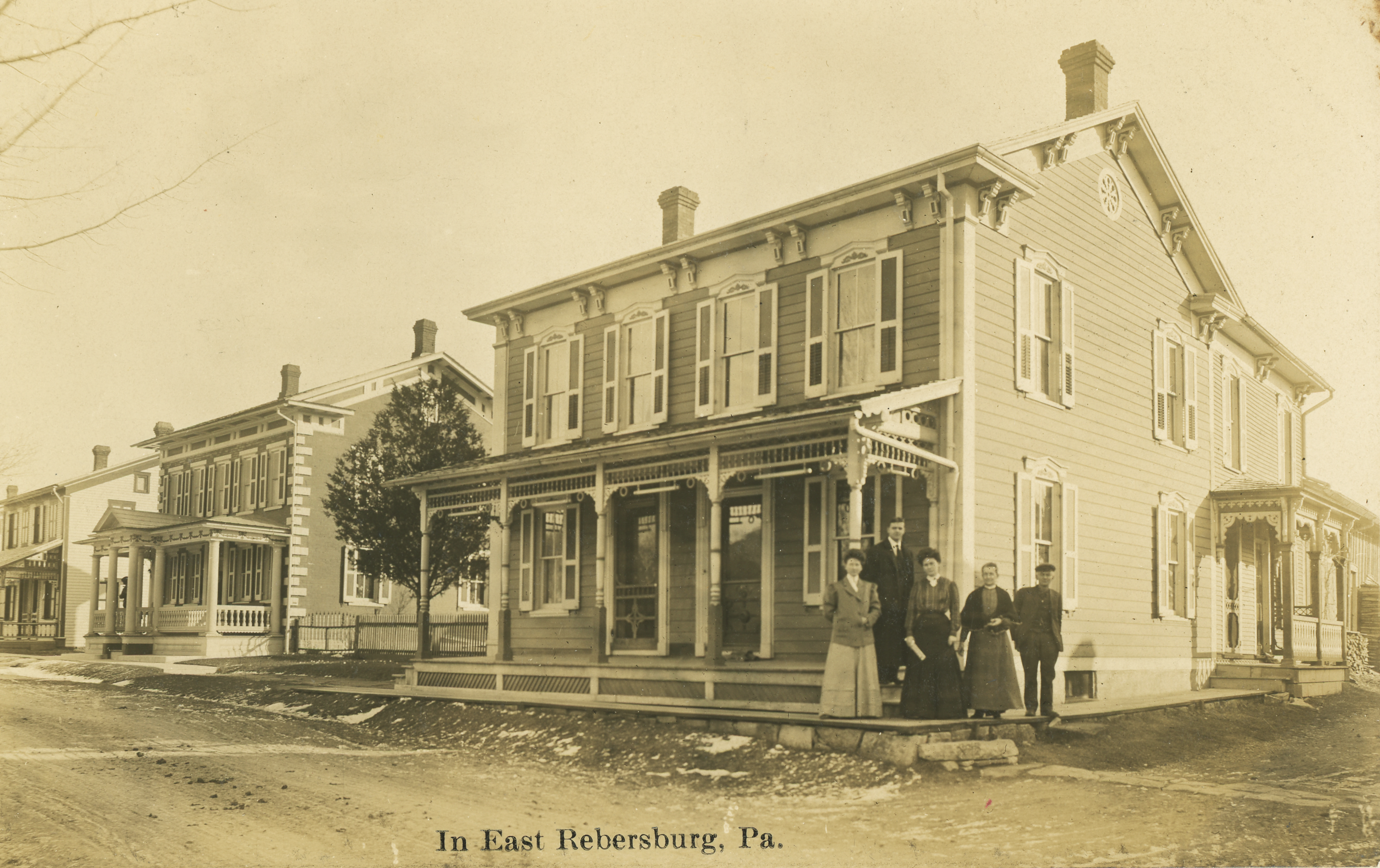 Residents posed for a photograph in front of a Rebersburg home. (Joan Brower Collection)