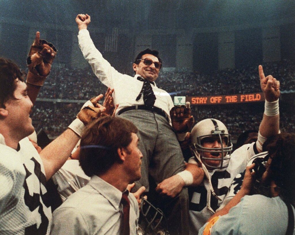 Coach Joe Paterno was carried off the field by his players after the 1983 Sugar Bowl game. (Penn State Archives)