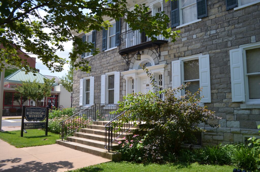 The Miles-Hume House was the original home of the library. It is now devoted to space for archives and research.