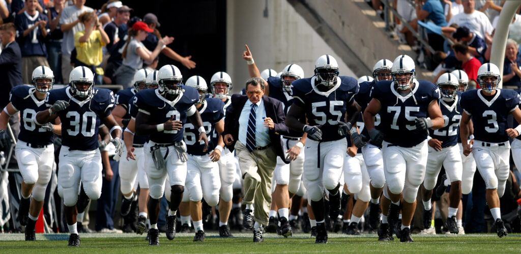 Joe Paterno was known for his gameday image, which included coat and tie, rolled up khaki slacks, white socks, and